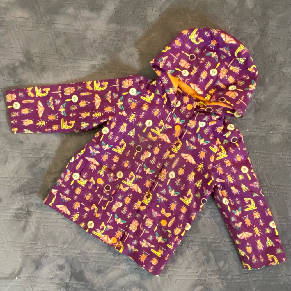 Like-new vibrant bugs rain coat